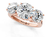 Rose gold Three-Stone Round Diamond Engagement Ring with Prong Setting on a Classic Band_12