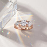 Rose gold Three-Stone Round Diamond Engagement Ring with Prong Setting on a Classic Band_27