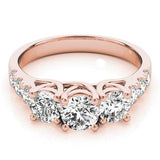 14K Rose Gold Three-Stone 1.55 Carat E VVS2 Round Diamond Pavé Band with Prong Setting