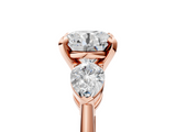 Rose gold Three-Stone Round Diamond Ring with Pear Side Stones in Four-Prong Setting_70