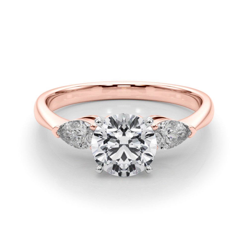 Rose gold Three-Stone Round Diamond Ring with Pear Side Stones on a Platinum Band with Four-Prong Setting 1