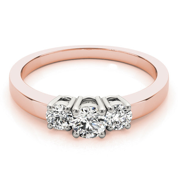 Rose gold Three-Stone Round Diamond Solitaire Ring with Channel Set Band and Four-Prong Setting 1