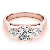 Rose gold Three-Stone Round Diamond Solitaire with Tapered Band and Four-Prong Setting 1