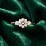 Rose gold Three-Stone Round Solitaire Ring with Tapered Band and Four-Prong Setting_6