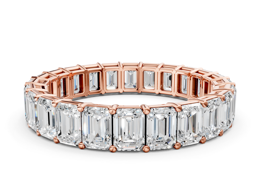 18K Rose Gold emerald  eternity band with shared prong setting