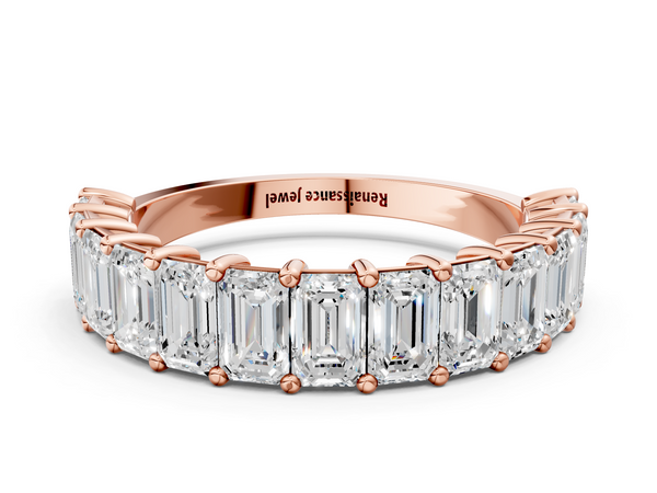 Rose gold emerald cut diamond half eternity band with shared prong setting