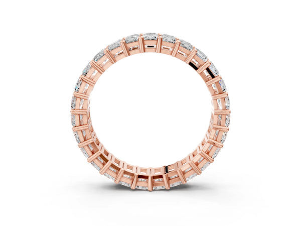 Rose gold radiant cut diamond eternity band with shared prong setting
