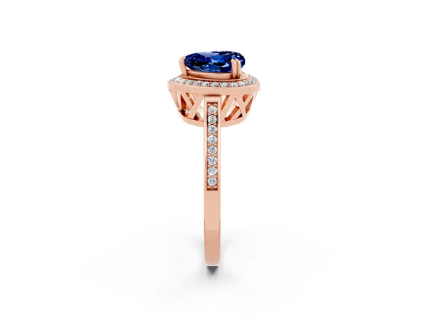 Rose gold Heart Cut Blue Sapphire Halo Ring with Split Shank and Four-Prong Setting