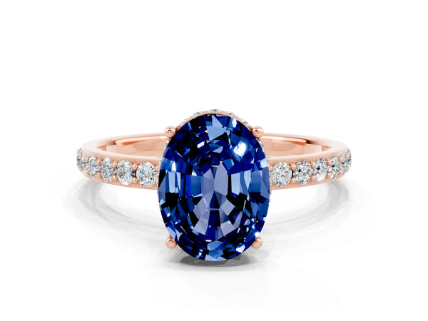 Rose gold Oval Cut Blue Sapphire Solitaire Ring with Pavé Band and Hidden Halo