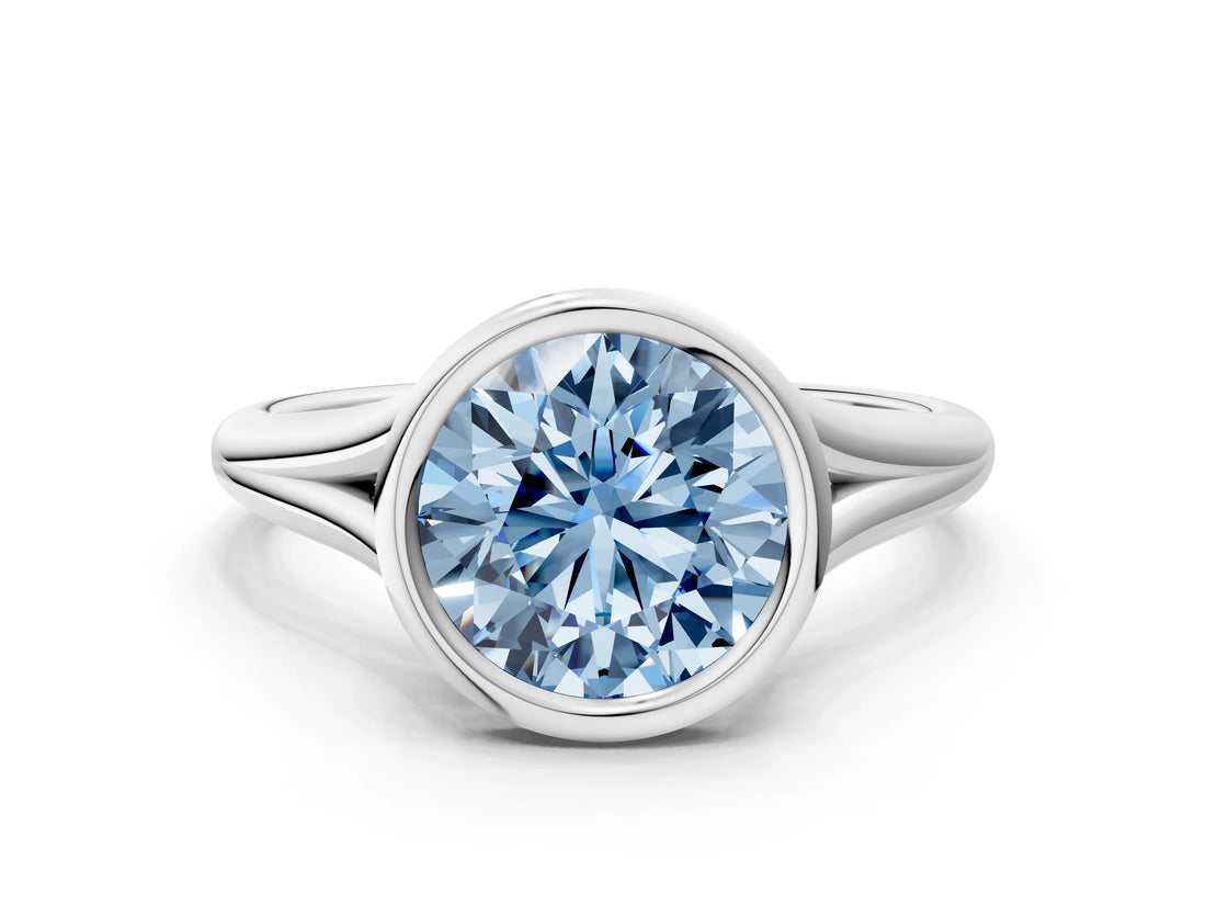 Silver Bezel Set Fancy Blue Round  Cut Solitaire Ring with Tapered Band
