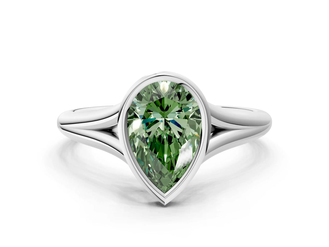 Silver Bezel Set Fancy Green Pear  Cut Solitaire Ring with Tapered Band 1