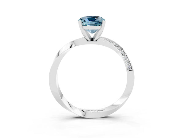 Silver Cushion Cut Aquamarine Engagement Ring with Side Stone Accents and Four-Prong Setting