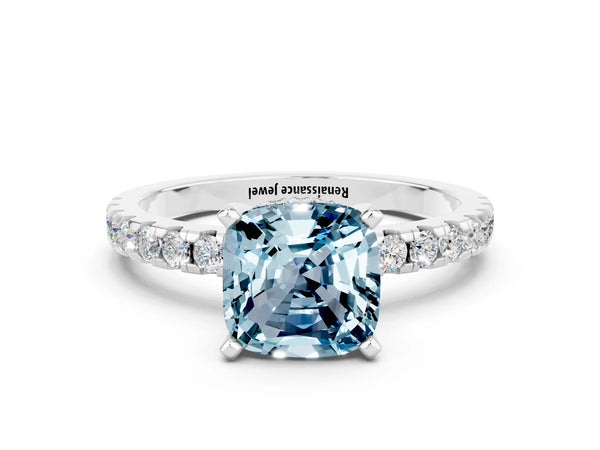 Silver Cushion Cut Aquamarine Solitaire Ring with Round Pavé Band and Four-Prong Setting