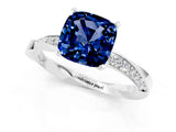 Silver Cushion Cut Blue Sapphire Engagement Ring with Side Stone Accents and Four-Prong Setting_13