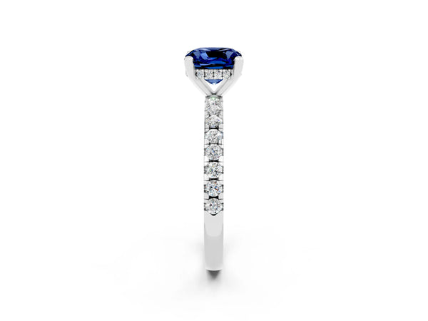 Silver Cushion Cut Blue Sapphire Solitaire Ring with Round Pavé Band and Four-Prong Setting
