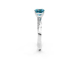 Silver Cushion Cut Blue Topaz Engagement Ring with Side Stone Accents and Four-Prong Setting_14