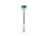 Silver Cushion Cut Blue Topaz Solitaire Ring with Round  Pavé Band and Four-Prong Setting_26