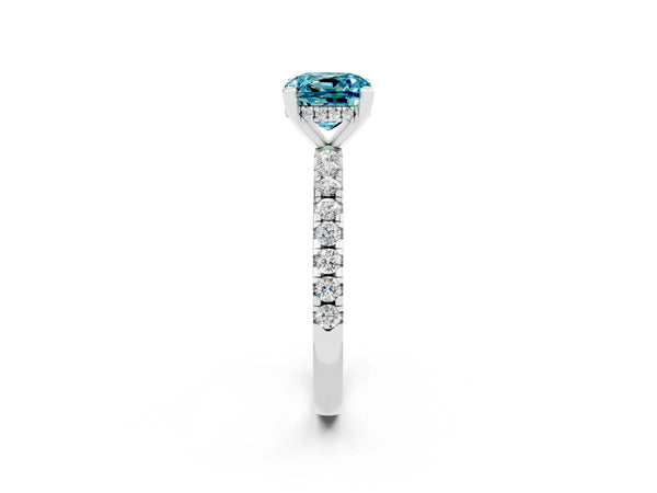 Silver Cushion Cut Blue Topaz Solitaire Ring with Round Pavé Band and Four-Prong Setting
