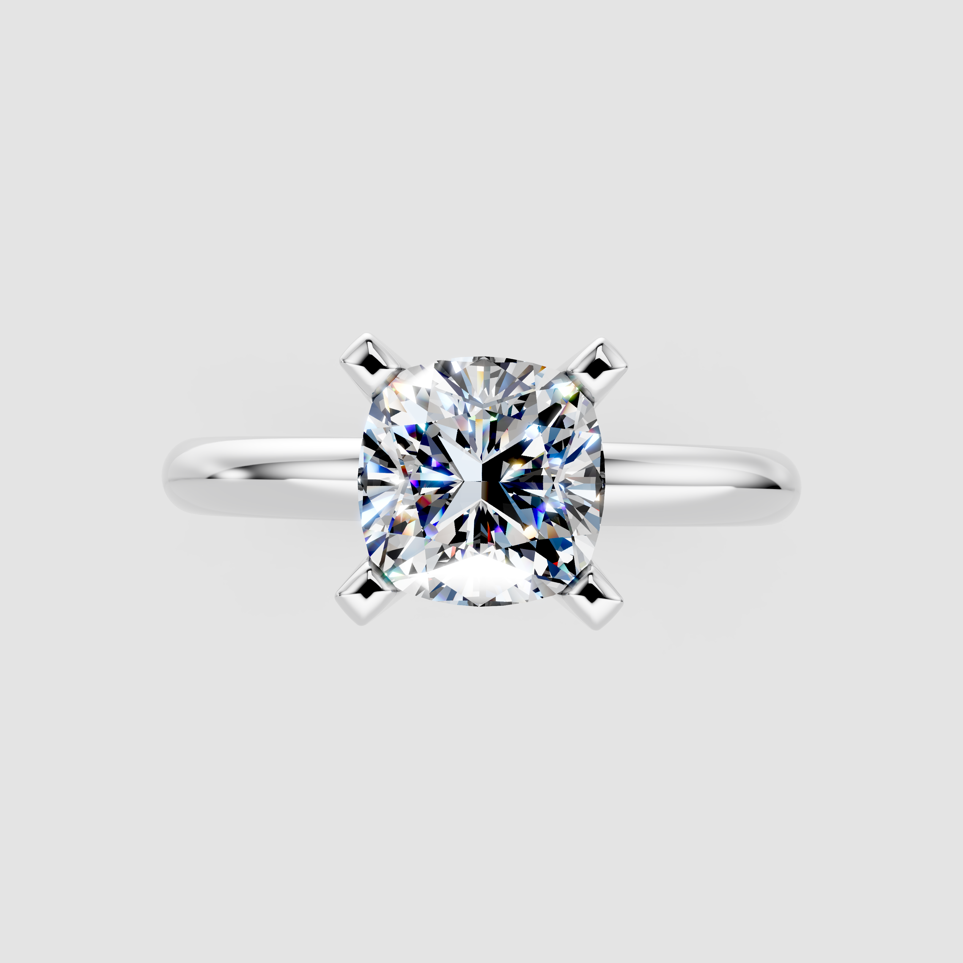 Silver Cushion Cut Solitaire Engagement Ring with Round Band and Four-Prong Setting
