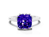 Silver Cushion Cut Tanzanite Solitaire Ring with Flower Prong Setting and Classic Band