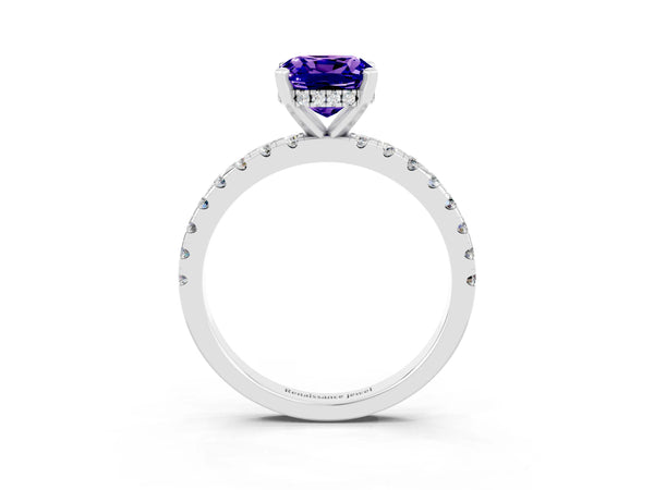 Silver Cushion Cut Tanzanite Solitaire Ring with Round Pavé Band and Four-Prong Setting