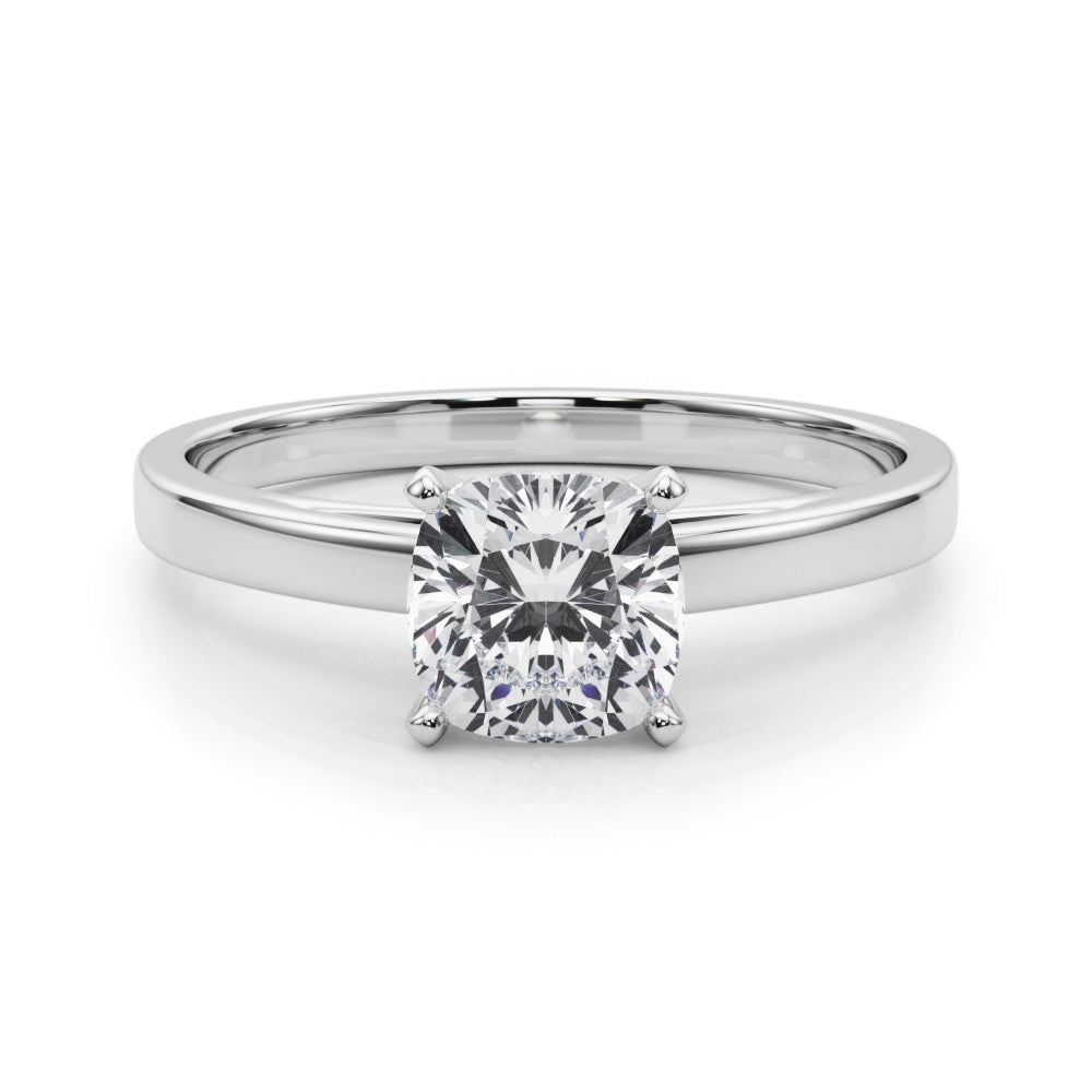 Silver Cushion Solitaire Diamond Engagement Ring with Four-Prong Setting on a Classic Band