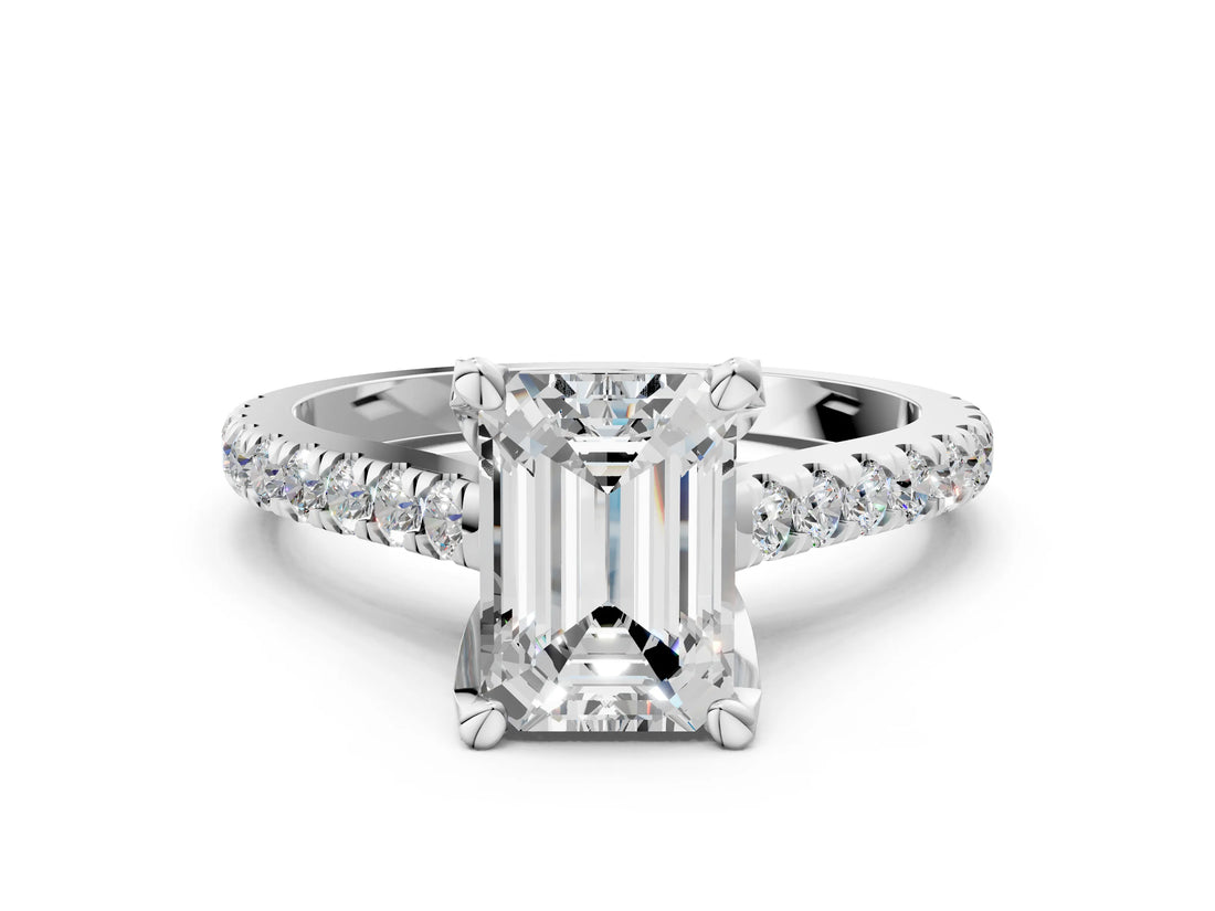 Silver Emerald Brilliant Diamond Solitaire with Pavé Band and Four-Prong Setting