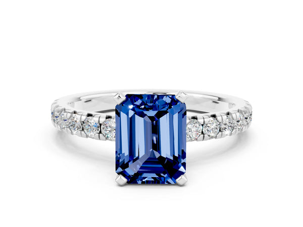 Silver Emerald Cut Blue Sapphire Solitaire Pavé Engagement Ring with Round Band and Prong Setting