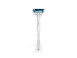 Silver Emerald Cut Blue Topaz Solitaire Engagement Ring with Cathedral Setting and Four-Prong Mount_8