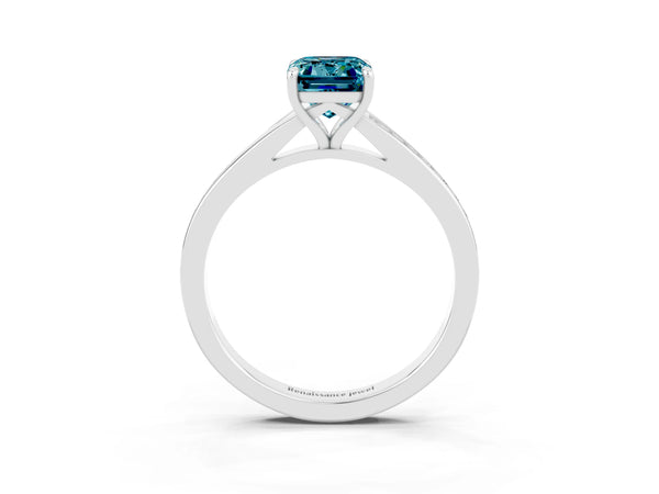 Silver Emerald Cut Blue Topaz Solitaire Ring with Pavé Band and Prong Setting
