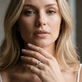 Silver Emerald Cut Diamond Prong Setting with Side Stones on a Pave Band_207