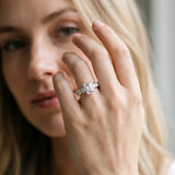 Silver Emerald Cut Diamond Prong Setting with Side Stones on a Pave Band_208