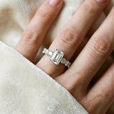 Silver Emerald Cut Diamond Prong Setting with Side Stones on a Pave Band_209