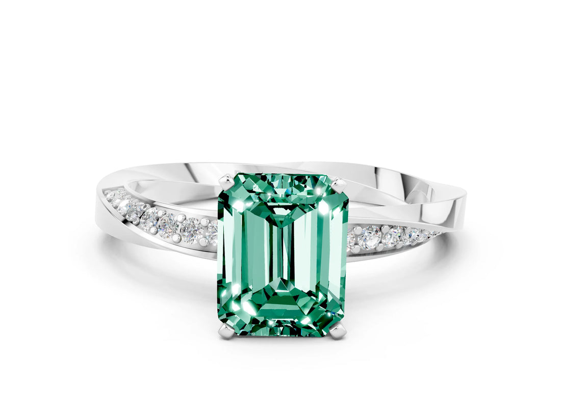 Silver Emerald Cut Green Sapphire Engagement Ring with Side Stone Accents and Four-Prong Setting_24