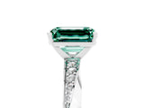 Silver Emerald Cut Green Sapphire Engagement Ring with Side Stone Accents and Four-Prong Setting_29