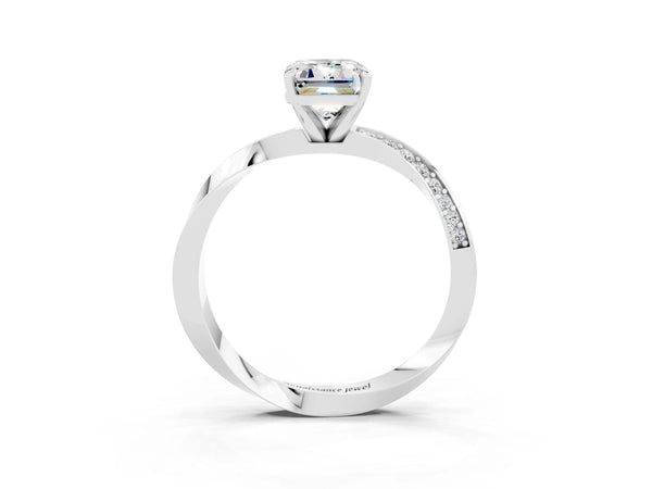 Silver Emerald Cut Moissanite Engagement Ring with Side Stone Accents and Four-Prong Setting