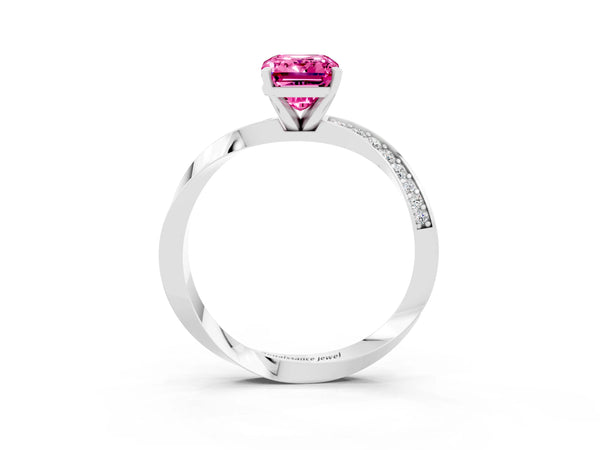 Silver Emerald Cut Pink Sapphire Engagement Ring with Side Stone Accents and Four-Prong Setting