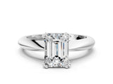 Silver Emerald Cut Solitaire Engagement Ring with Tapered Band and Four-Prong Setting