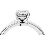 Silver Emerald Solitaire Diamond Ring with Six-Prong Setting on a Classic Band 4