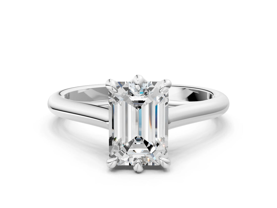 Silver Emerald Solitaire Engagement Ring with Six-Prong Setting and Classic Band