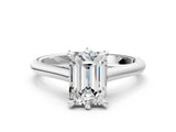 Silver Emerald Solitaire Engagement Ring with Six-Prong Setting and Classic Band