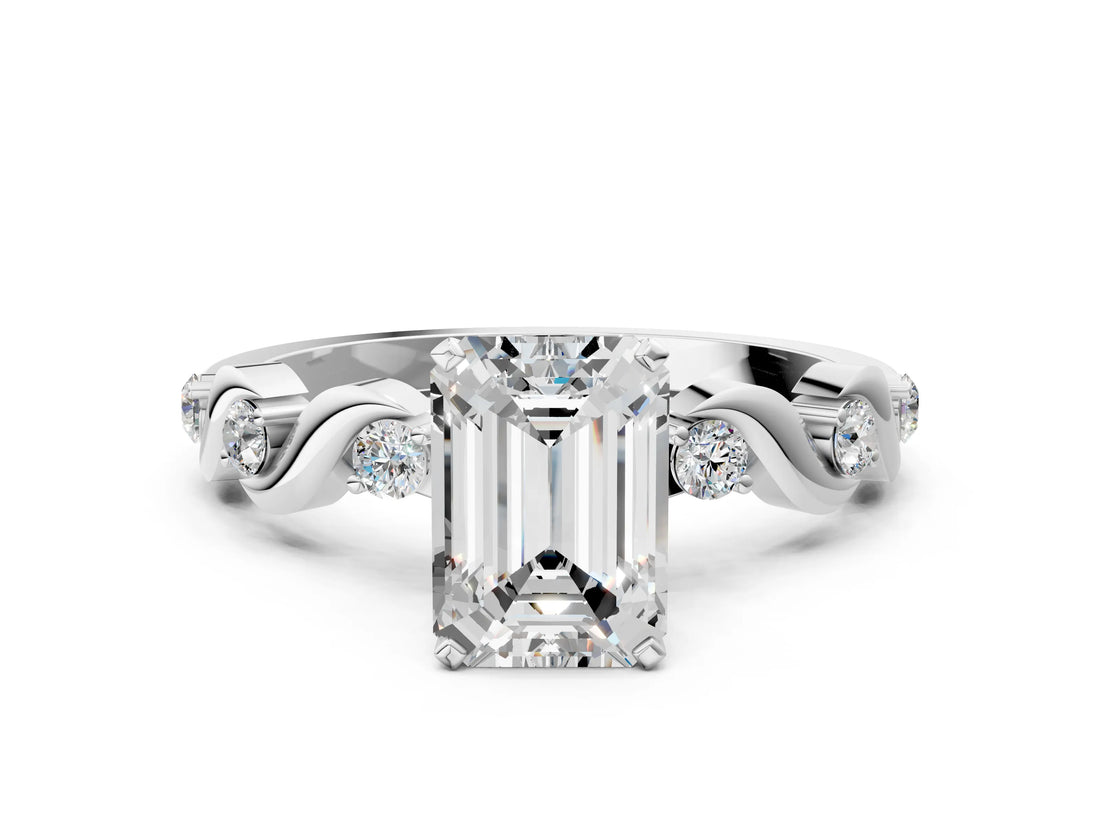 Silver Emerald Solitaire Twisted Band with Prong Setting