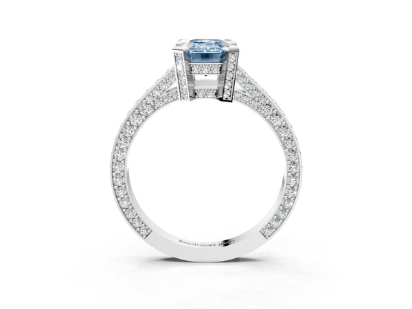 Silver Fancy Blue Emerald Cut Brilliant Split Shank Pave Solitaire Ring with Four-Prong Setting