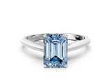 Silver Fancy Blue Emerald Cut Diamond Solitaire Engagement Ring with Cathedral Setting and Four-Prong Mount