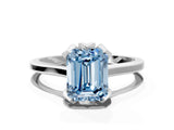 Silver Fancy Blue Emerald Cut Diamond Solitaire Ring with Flower Prong Setting and Classic Band