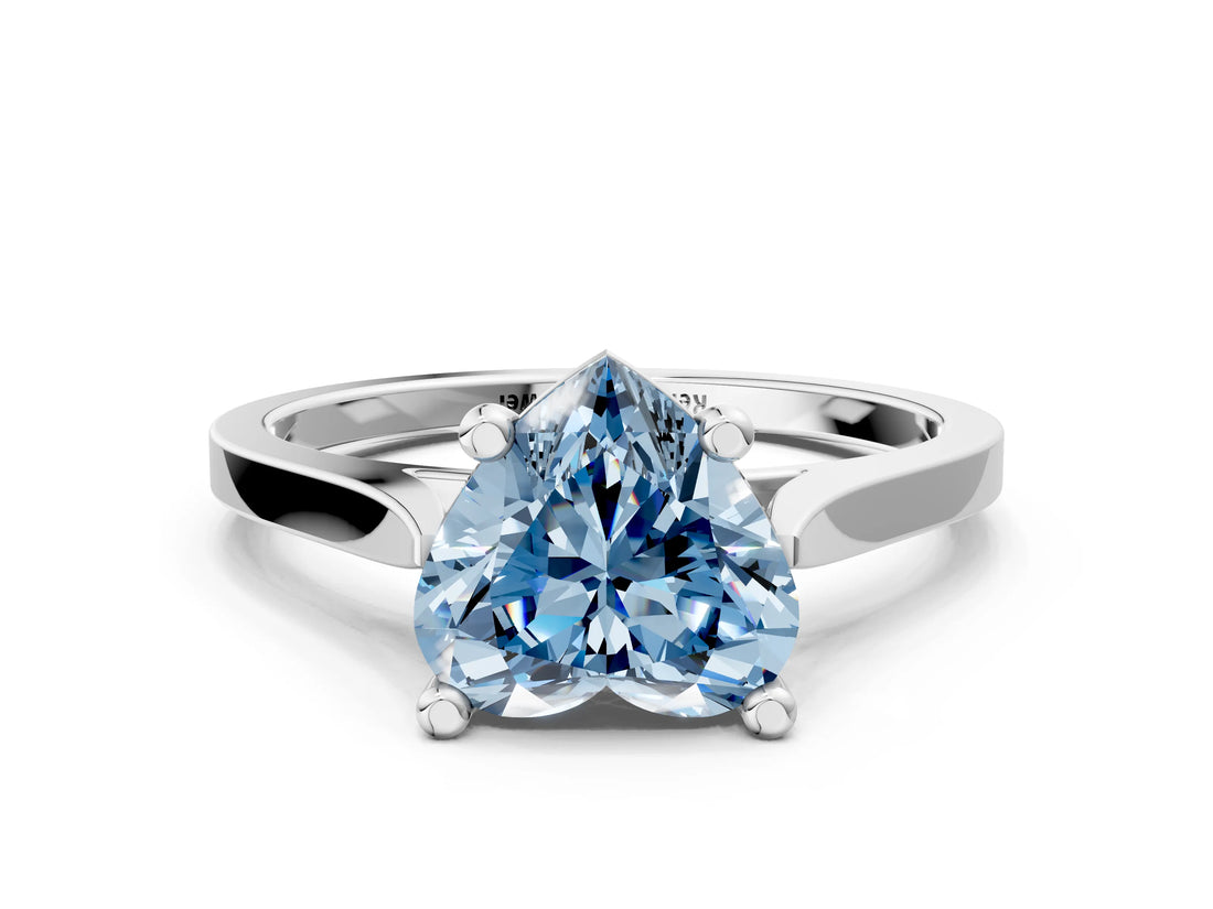 Silver Fancy Blue Heart  Solitaire Diamond Ring with Four-Prong Setting and Tapered Band