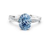 Silver Fancy Blue Oval Cut Diamond Engagement Ring with Side Stone Accents and Four-Prong Setting