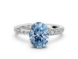 Silver Fancy Blue Oval  Cut Diamond Solitaire with Pave Band and Four-Prong Setting