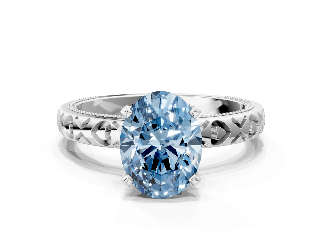 Silver Fancy Blue Oval  Solitaire Diamond Engagement Ring with XO Engraved Band and Four-Prong Setting 1
