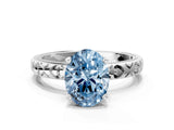 Silver Fancy Blue Oval  Solitaire Diamond Engagement Ring with XO Engraved Band and Four-Prong Setting 1
